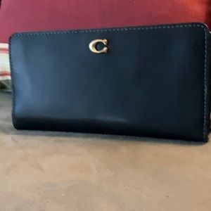 Smooth black leather skinny Coach wallet